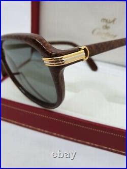 cartier vitesse sunglasses|cartier unisex glasses.